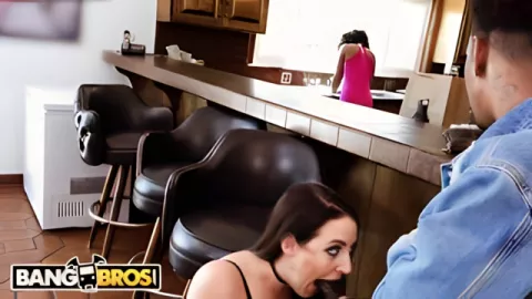 A black man fucks his wife's white girlfriend after a blowjob at the kitchen table near his wife