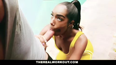A sporty black woman in a yellow T-shirt is fucked by a white coach