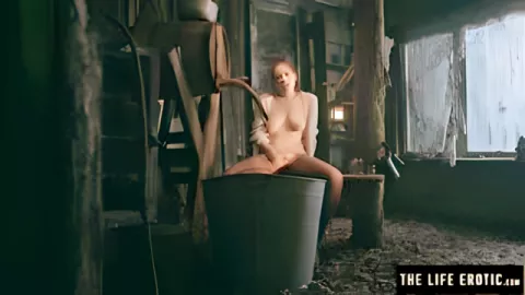 MILF with chubby tits masturbates hard in a forest hut